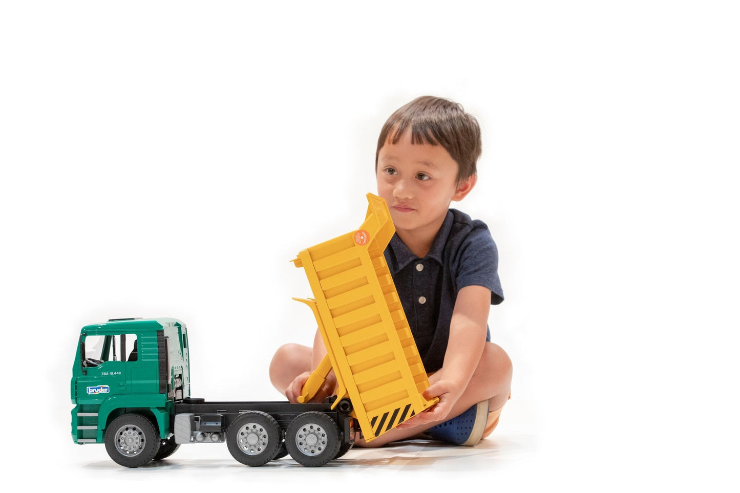 Bruder MAN TGA Tip Up Truck-Mountain Baby